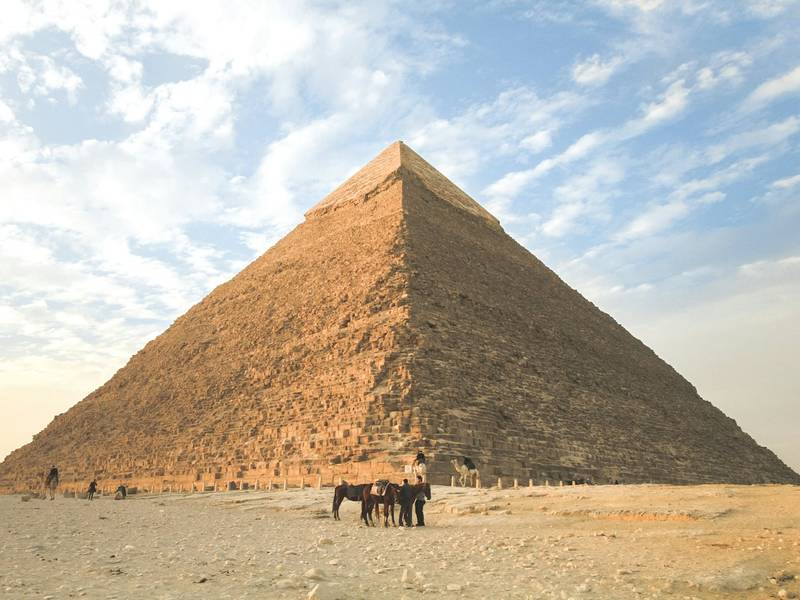 The Pyramid of Khafre under a blue sky at Giza